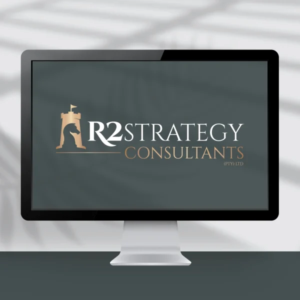 Computer screen showing a logo design with a chess piece