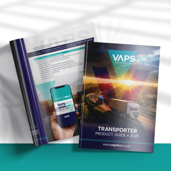 Open pages of a brochure with an image of a truck on a highway at sunset