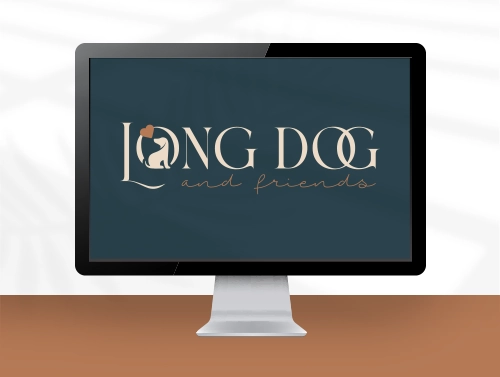 Computer screen showing a logo design with a dachshund and a heart