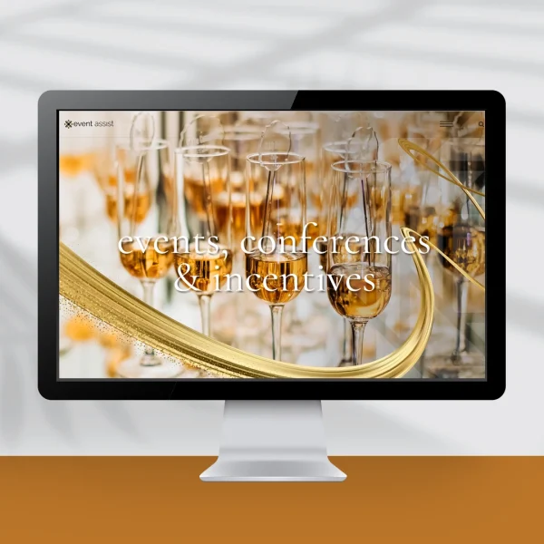 Computer screen showing a website design with champagne glasses for an events company